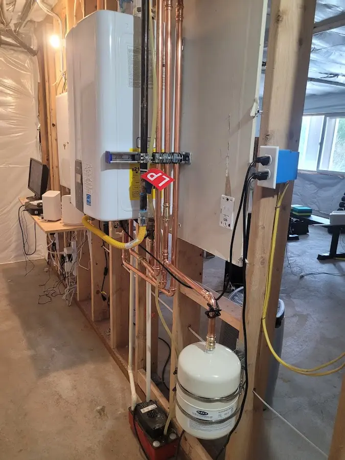 Licensed plumber repairing a kitchen sink in Lincoln